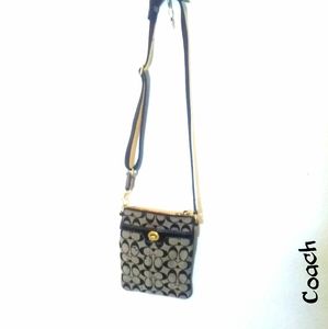 Coach small crossbody logo bag in black tan